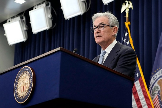 Fed tăng lãi suất lần thứ 9 liên tiếp - Ảnh 1.