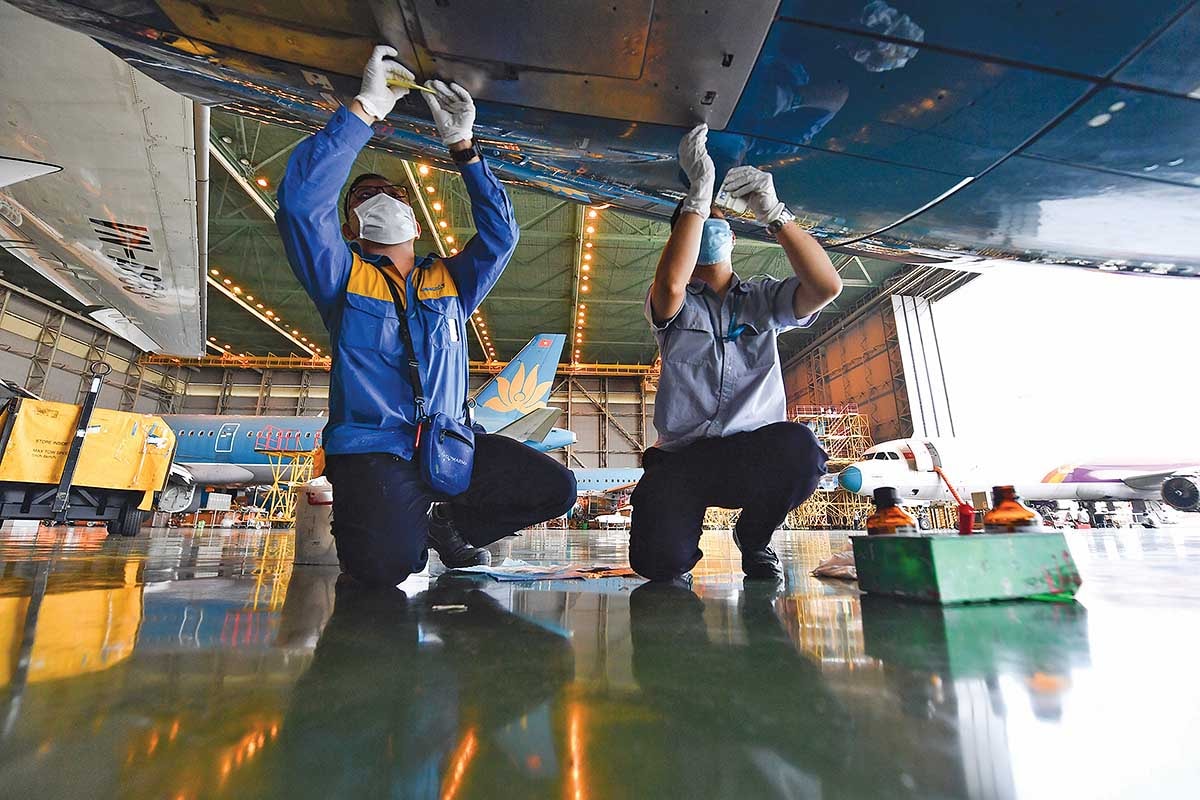 Công tác bảo dưỡng tàu bay của Vietnam Airlines phục vụ cao điểm Tết (Ảnh: P.V)