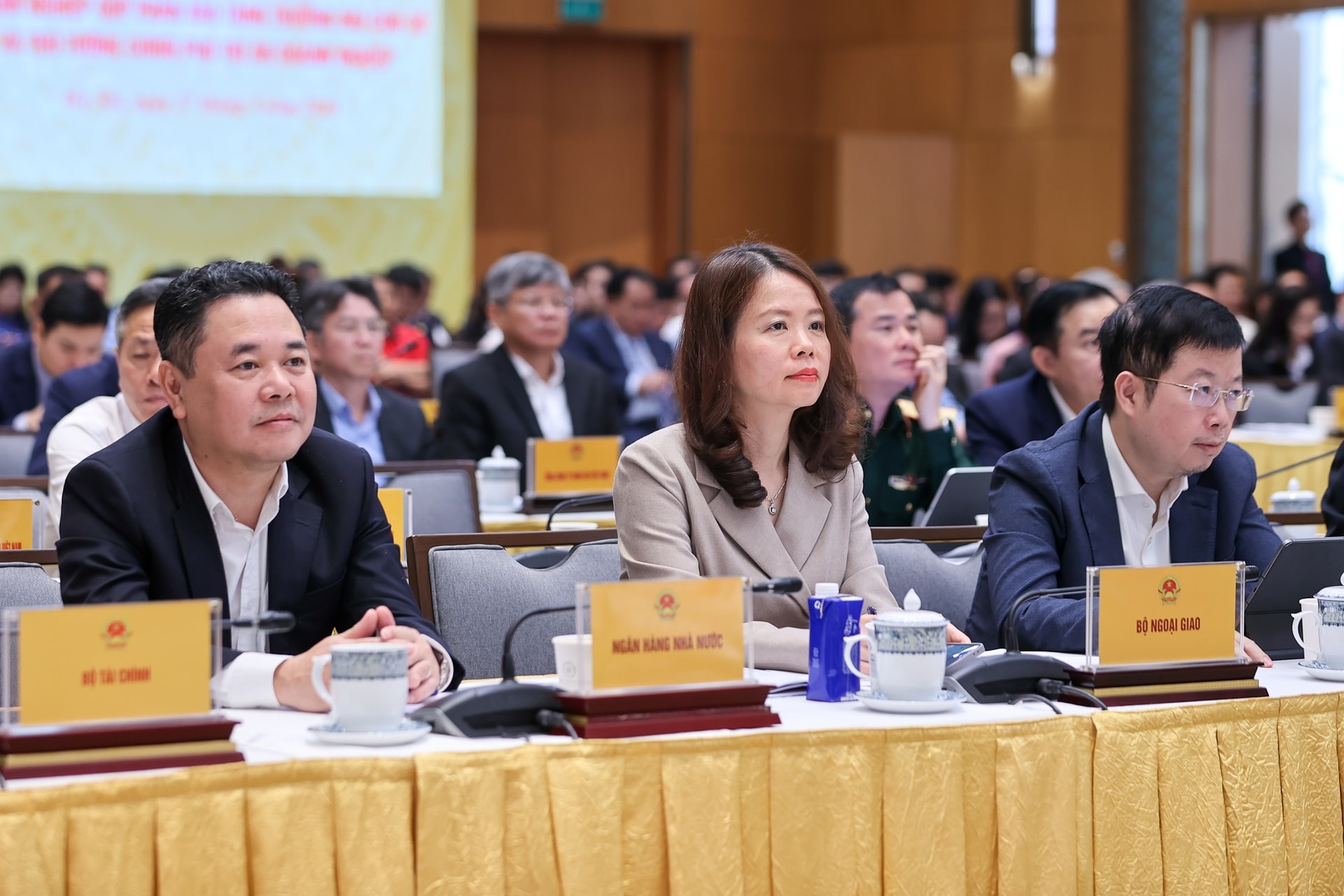 Phó Thống đốc NHNN Nguyễn Ngọc Cảnh và các đại biểu dự Hội nghị - Ảnh VGP/Nhật Bắc